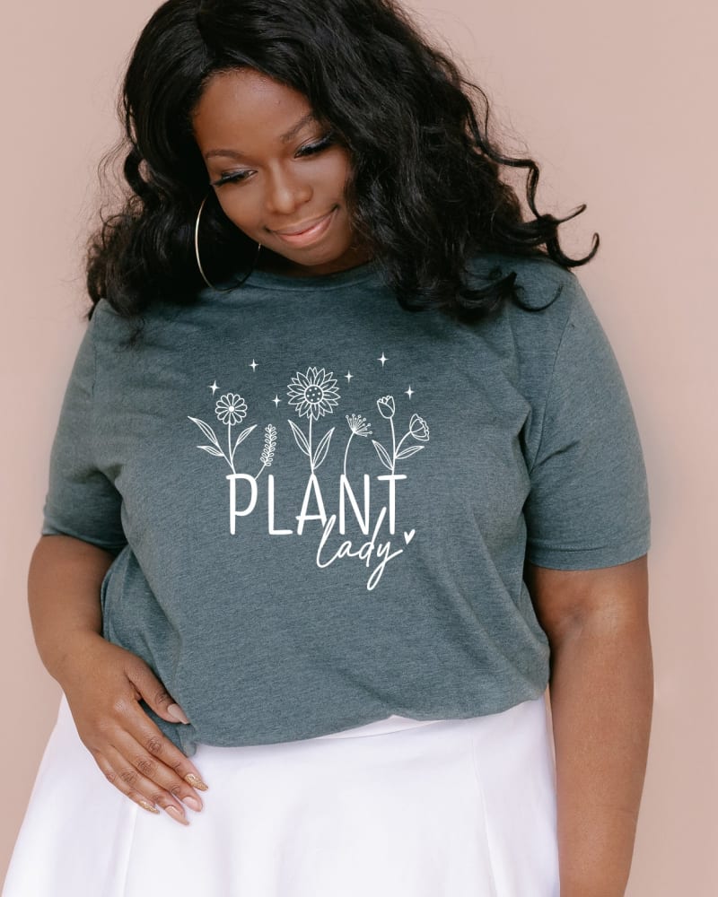Front of a model wearing a size 2XL Plant Lady Flowers in Forest by Simply Sage Market. | dia_product_style_image_id:281568